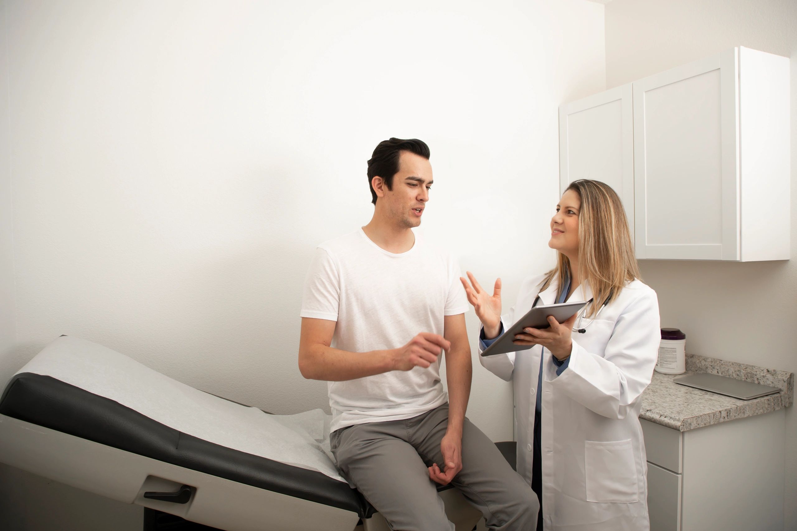 Doctors and patients interacting in a clinic